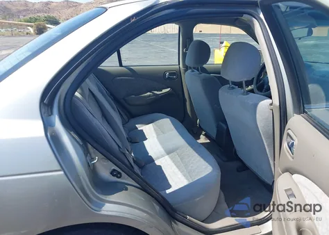 2003 Nissan Sentra Xe z USA, uszkodzony, nr VIN 3N1CB51D53L777242